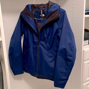 Women’s blue North face ski jacket with purple shell that can be worn separately